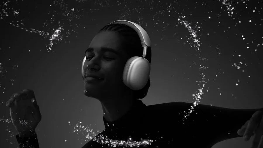 Person wearing headphones with text about noise-cancelling technology on a dark background