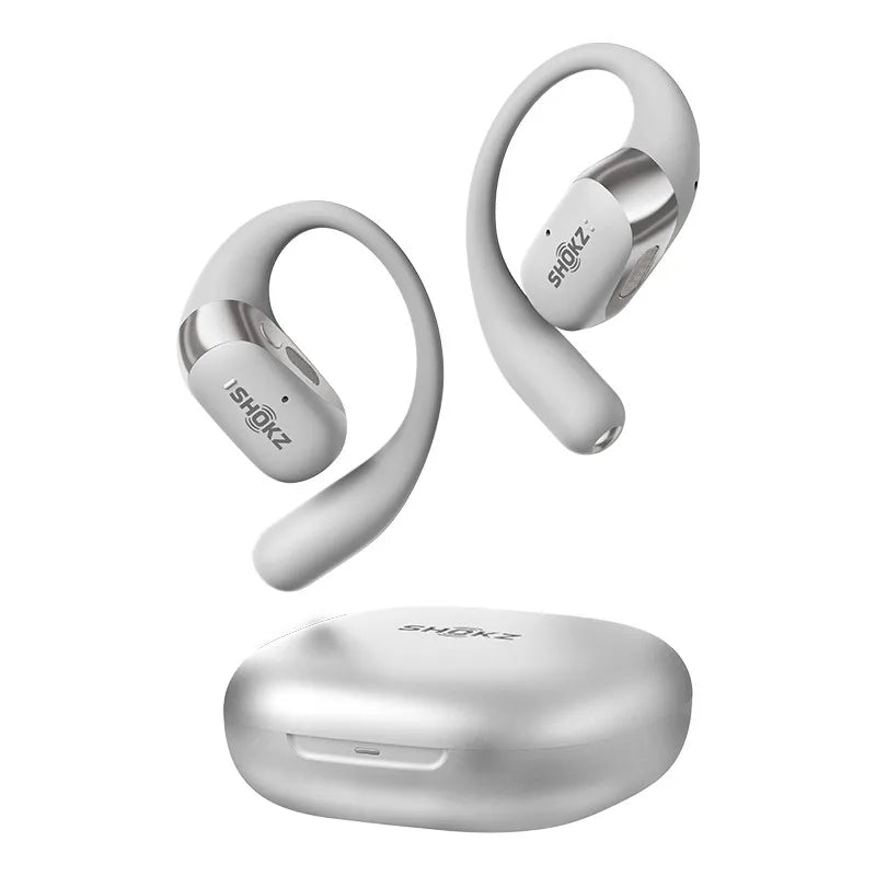 White wireless earbuds with charging case on a white background