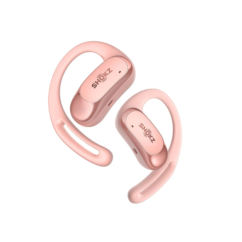Rose gold wireless earbuds with SHOKZ branding on a white background